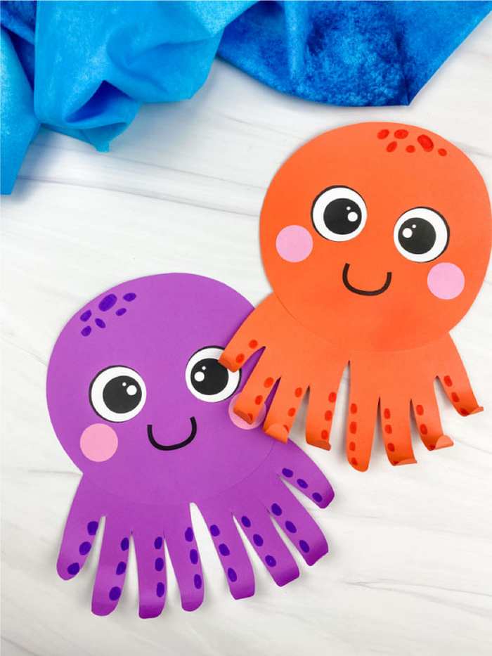 Kids octopus handprint craft with colorful painted hands forming octopus shape