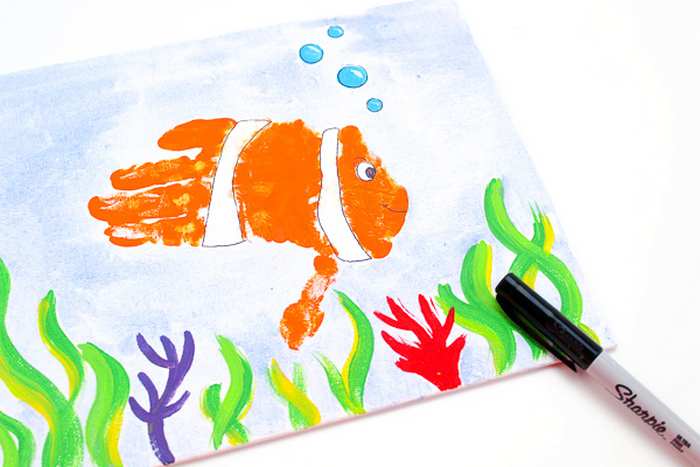 Colorful handprint fish craft for kids
