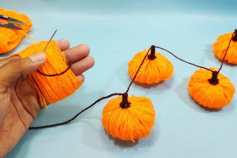 The Easiest Method to DIY Pumpkin Fall Garland + No-Knit Pumpkin Guide