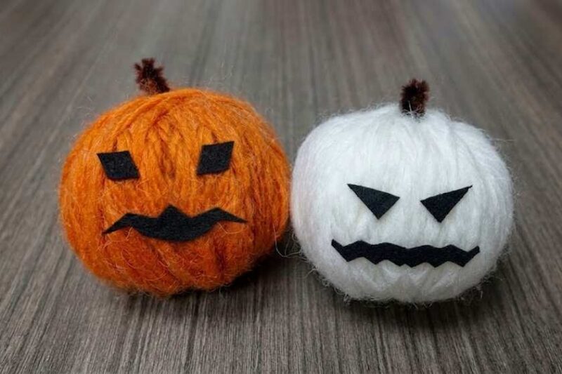 DIY Spooky Orange and White Yarn Pumpkins for Halloween
